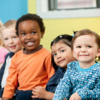 A group of preschool children smiling