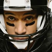 African American man wearing football uniform